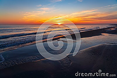 Brightly colorful sunrise on the sea coast.Nature wallpaper Stock Photo