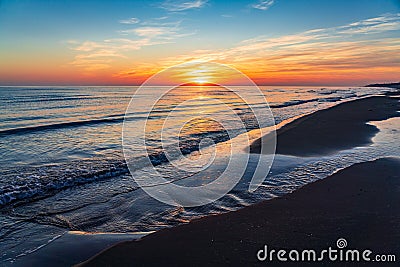 Brightly colorful sunrise on the sea coast.Nature wallpaper Stock Photo