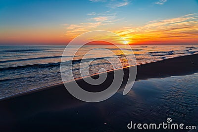 Brightly colorful sunrise on the sea coast. Nature wallpaper Stock Photo