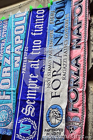 Brightly coloured football scarves for sale Naples Italy Editorial Stock Photo