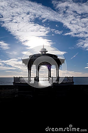 Brighton Band silhoutted by sun dramatic sky Stock Photo