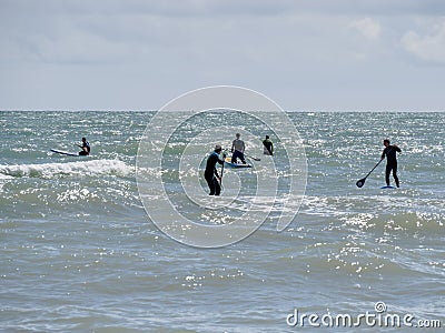 BRIGHTON, EAST SUSSEX/UK - MAY 24 : People paddle boarding at Br Editorial Stock Photo