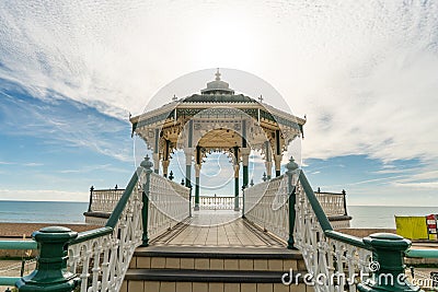 Brighton Pier Beach with Victorian bandstand octagonal pavilion Chinese and Indian style in the background Stock Photo