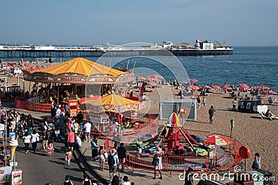 Crowd of british people walking and having fun at brighton town coastline. People active outdoor Editorial Stock Photo