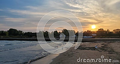 Brilliant Beach Sunset on Lake Erie Stock Photo