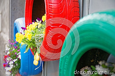 Brilliant idea for tires used as planters environmentally Stock Photo