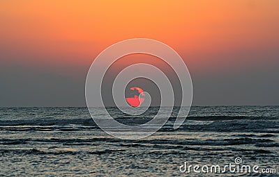 Brilliant Sunrise Over the Ocean Stock Photo