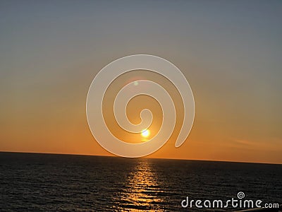 Brilliant sunset from cruise ship. Stock Photo