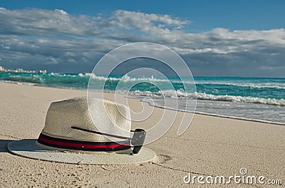 Bring your hat and sunglass to the beach Stock Photo