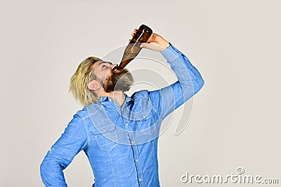 Bringing Spirit of Life. relax after working day. lets have fun. bearded man has hangover. mature man drink beer Stock Photo