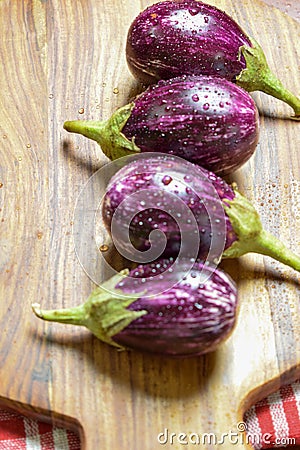 Brinjal, Eggplant, or Aubergine, on Wooden Background Stock Photo