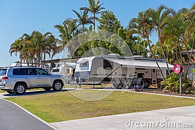 Caravan And Towing Vehicle Parked At Brisbane Holiday Village Editorial Stock Photo