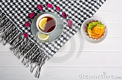 A brisk morning Black tea with lemon and cake Stock Photo