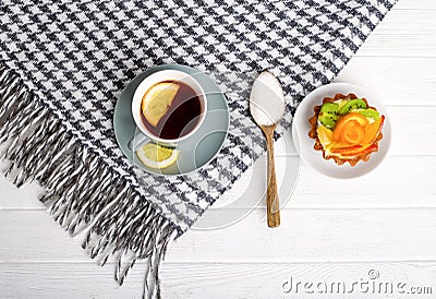 A brisk morning Black tea with lemon and cake Stock Photo