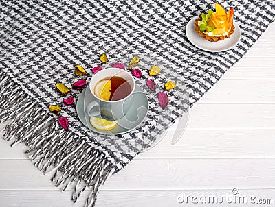 A brisk morning Black tea with lemon and cake Stock Photo