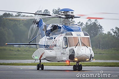 A Bristow Helicopters Sikorsky S-61N on final to Bergen Airport Editorial Stock Photo