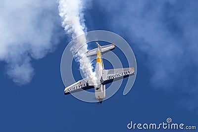 British aerobatic pilot Mark Jefferies flying a single engine Extra 330LX aerobatic aircraft VH-IXN. Editorial Stock Photo