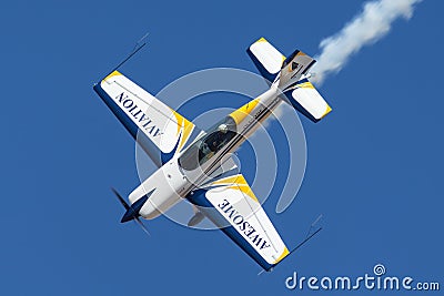 British aerobatic pilot Mark Jefferies flying a single engine Extra 330LX aerobatic aircraft VH-IXN. Editorial Stock Photo