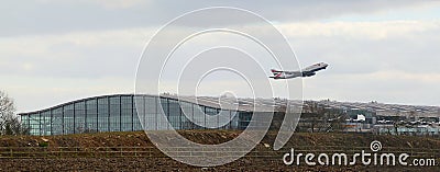 British Airways Boeing 747 taking-off over Terminal 5 Heathrow Editorial Stock Photo