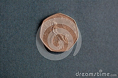 British coin fifty pence on table in Kastrup Copenhagen Editorial Stock Photo