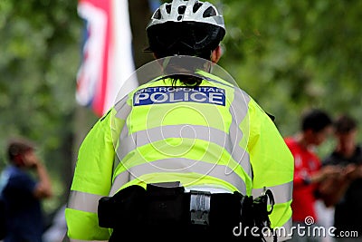 British Female Police cyclist Editorial Stock Photo