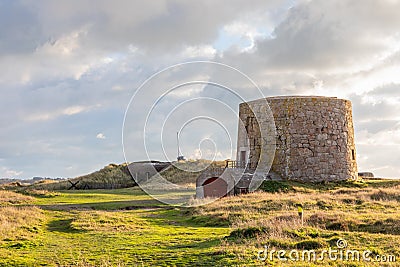 British Lewis Tower with nazi bunker in the background, Saint Quen, bailiwick of Jersey, Channel Islands Stock Photo