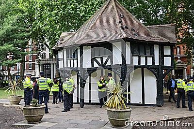 28 7 2022: British policeman briefing at Soho Square, London, preparing a major event, guarding the city Editorial Stock Photo