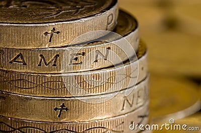 British pound coins spelling Amen Stock Photo