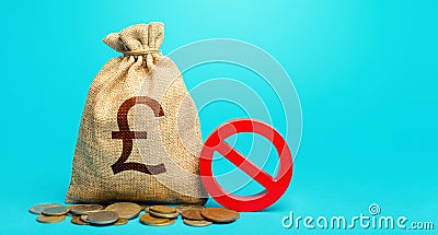 British pound sterling money bag and red prohibition sign NO. Confiscation of deposits. Termination projects. Monetary Stock Photo