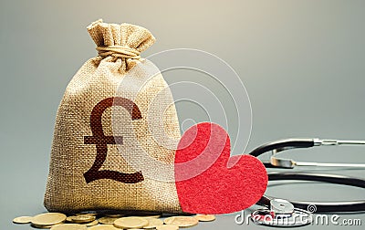 British pound sterling money bag and stethoscope. Health life insurance financing concept. Reforming and preparing for new Stock Photo