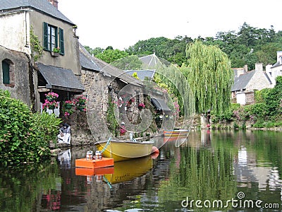 In Brittany, seen the picturesque houses with their flowery facades. Stock Photo