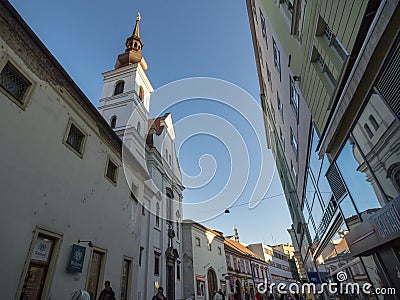 Kostel svate mari magdaleny also called saint mary magdalene church in a Medieval pedestrian narrow street of Brno, Frantiskanska Editorial Stock Photo