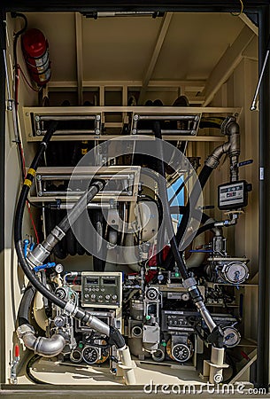 Brno, Czechia - October 08, 2021: Gas or fuel meters and pipes inside military refuelling track, closeup detail from presentation Editorial Stock Photo