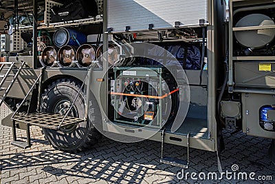Brno, Czechia - October 08, 2021: Interior of decontamination military truck vehicle with chemicals canisters and other equipment Editorial Stock Photo
