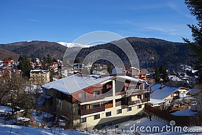 Broad view over Busteni mountain resort in Romania in winter Stock Photo