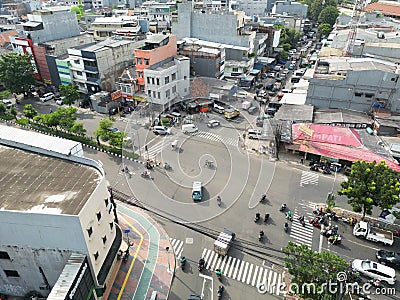 a broad view of transportation and urban spatial planning and community activities in crowded Jakarta, Indonesia Editorial Stock Photo