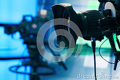 Broadcast television studio camera and crane camera in news studio room Stock Photo