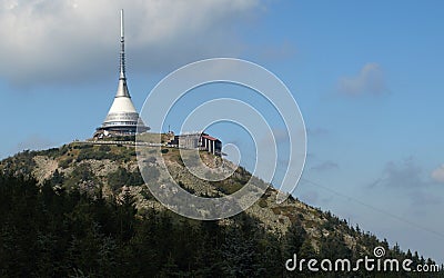 Broadcast tower and hotel Stock Photo