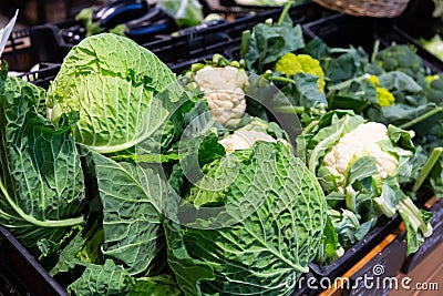 Broccoflower, cauliflower, broccoli, cabbage at market Stock Photo