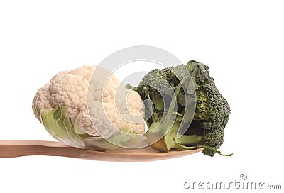 Broccol and a mini cauliflower on a wooden spoon Stock Photo