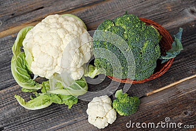 Broccoli and cauliflower on a wooden table Stock Photo
