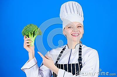 Broccoli has impressive nutritional profile. Woman chef hold broccoli vegetable. Healthy vegetarian recipes. Healthy Stock Photo