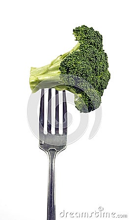 Broccoli On Top Of Fork Isolated On White Stock Photo