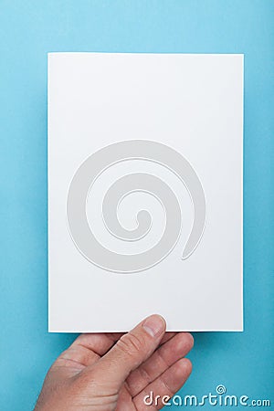 A5 brochure flyer, mockup. Blue background. Stock Photo