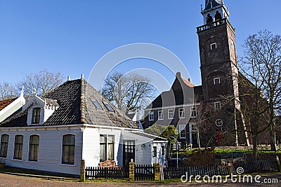 Broek in Waterland, Netherlands. February 2023. The wooden facades and old houses in Broek in Waterland, Holland. Editorial Stock Photo