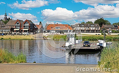 Beautiful dutch Maas river landscape, old idyllic waterfront village, ferry to Arcen Editorial Stock Photo