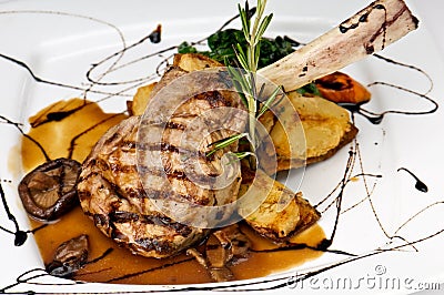 Broiled center cut veal chop Stock Photo