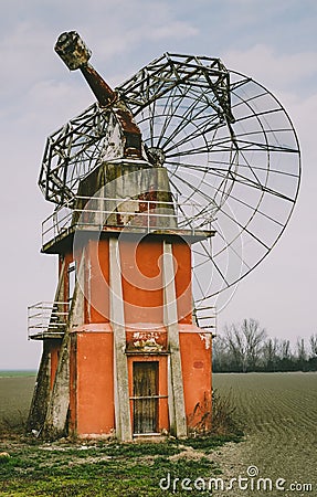 Broken and abandoned radio telescope Stock Photo