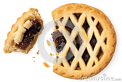 Broken all butter lattice topped mince pie isolated on white from above. Fruit filling visible Stock Photo
