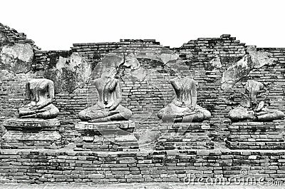 Broken Ancient Buddha Statues Ruins at Wat Chaiwatthanaram in The Historic City of Ayutthaya, Thailand in Classic Vintage Black an Stock Photo